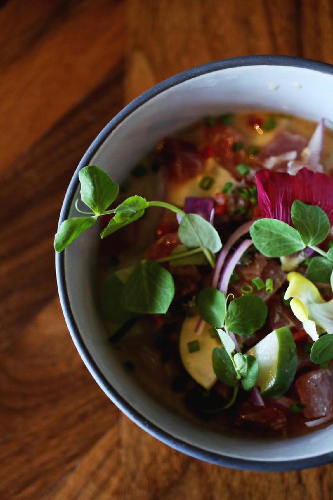 The Tiger Style Ceviche is made up of NC tuna, red onion, toasted Carolina corn nuts , farmer’s market aji, onion ash and cold seafood Leche De Tigre broth at The Cortez in Raleigh.