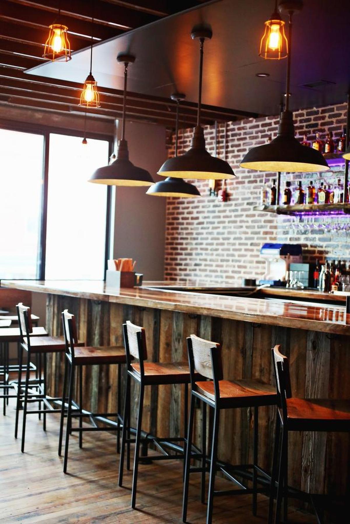 The upstairs izakaya at Tonbo Ramen will specialize in small bites to snack on while drinking. There will be 12 beers on tap, mostly from North Carolina, plus a sake and cocktail list. There’s also a pair of whirling frozen cocktail machines spitting out boozy adult slushies, one rum-based, one bourbon.