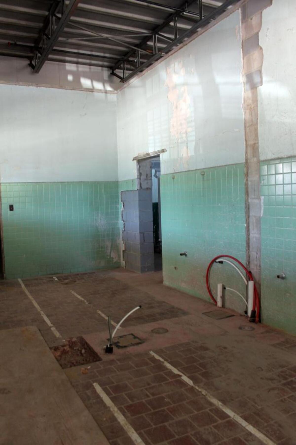 In the Hummingbird space, which still has old mint green tiles on the walls, tape outlines where the 10-stool bar will be. The stools will be repurposed from other venues, including Finch’s, the restaurant next to PoshNosh that was torn down to make way for roadwork. An adjacent room will be more of a lounge with another dozen seats. Most of the seating will be outside on the patio – about 40 to 50 seats.