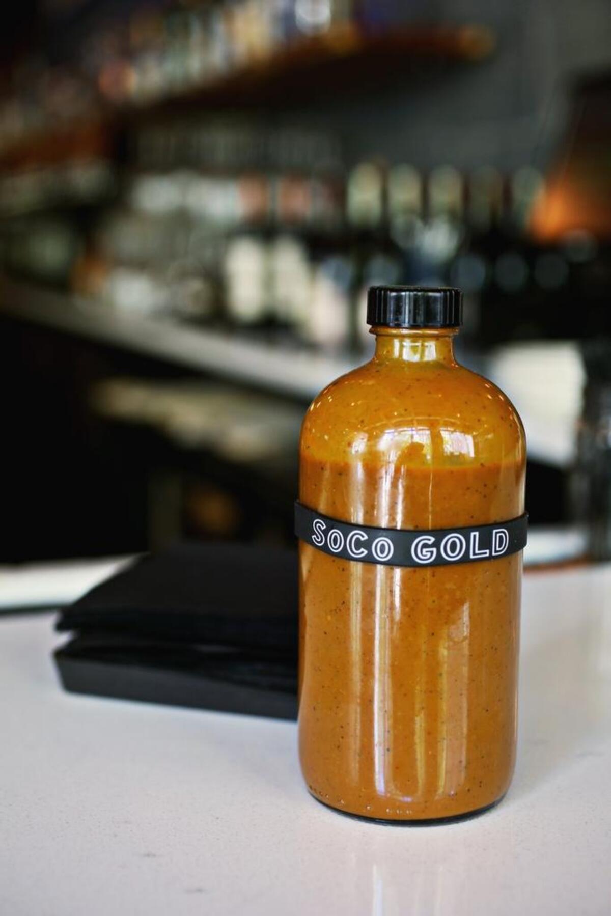 Bare Bones chef Taion McElveen has created renditions of regional barbecue sauces: Piedmont Red, Texas Rouge, and So-Co Gold, a South Carolina-style mustard-based sauce (the chef is a native of that state.)