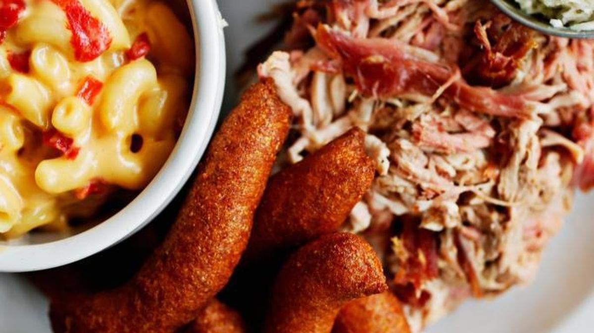 Pork shoulders, subtly smoky and pulled into coarse shreds so juicy you’ll think twice before adding sauce, is just one attraction at Picnic in Durham where the fried chicken is so good you’re almost tempted to order it instead. Almost.