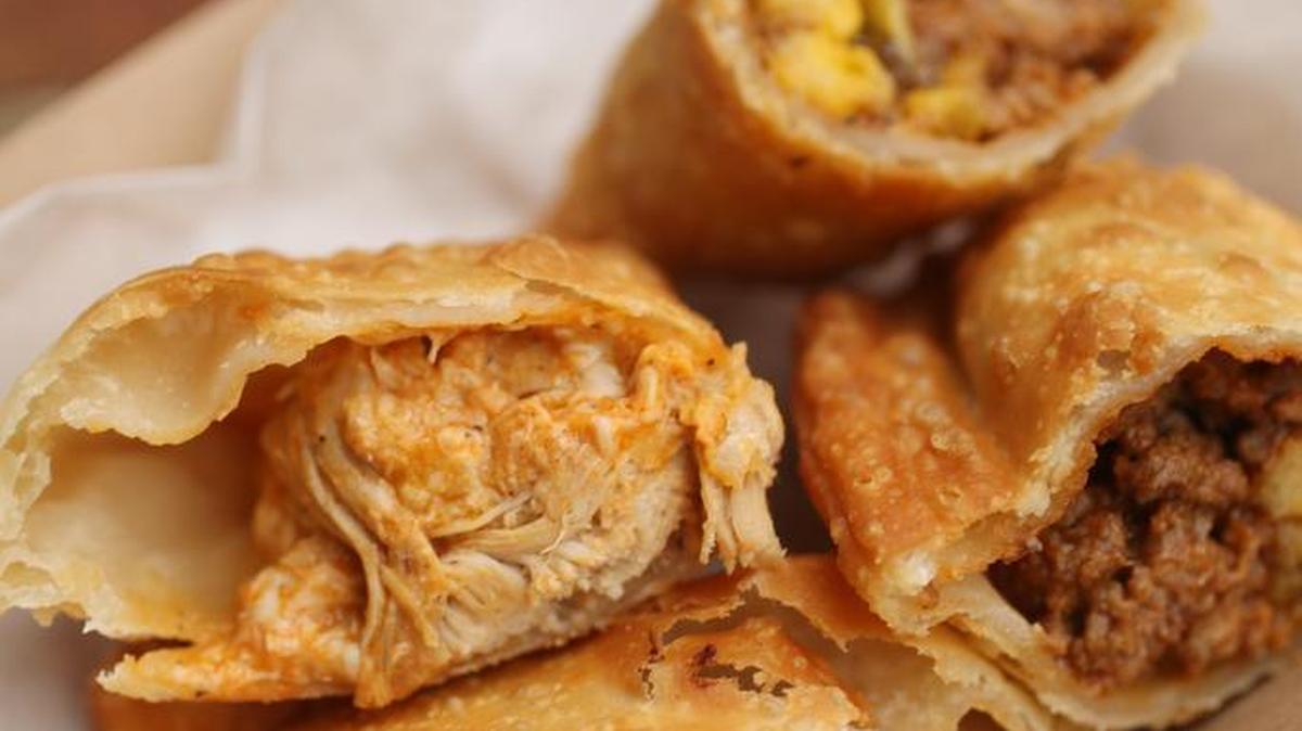The Buffalo Chicken Empanada and Beef Empanada are popular items on the menu on the Spanglish food truck.