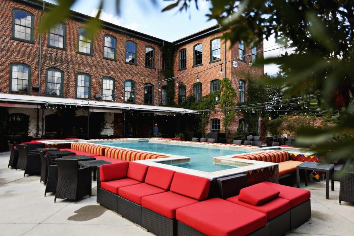 The patio at Mulino, photographed in 2017, is more of a courtyard, really, with mosaic tile tabletops, plants spilling out of large earthenware pots, and a large central reflecting pool combining to evoke an Italian piazza,  is a setting unlike any other in the Triangle.