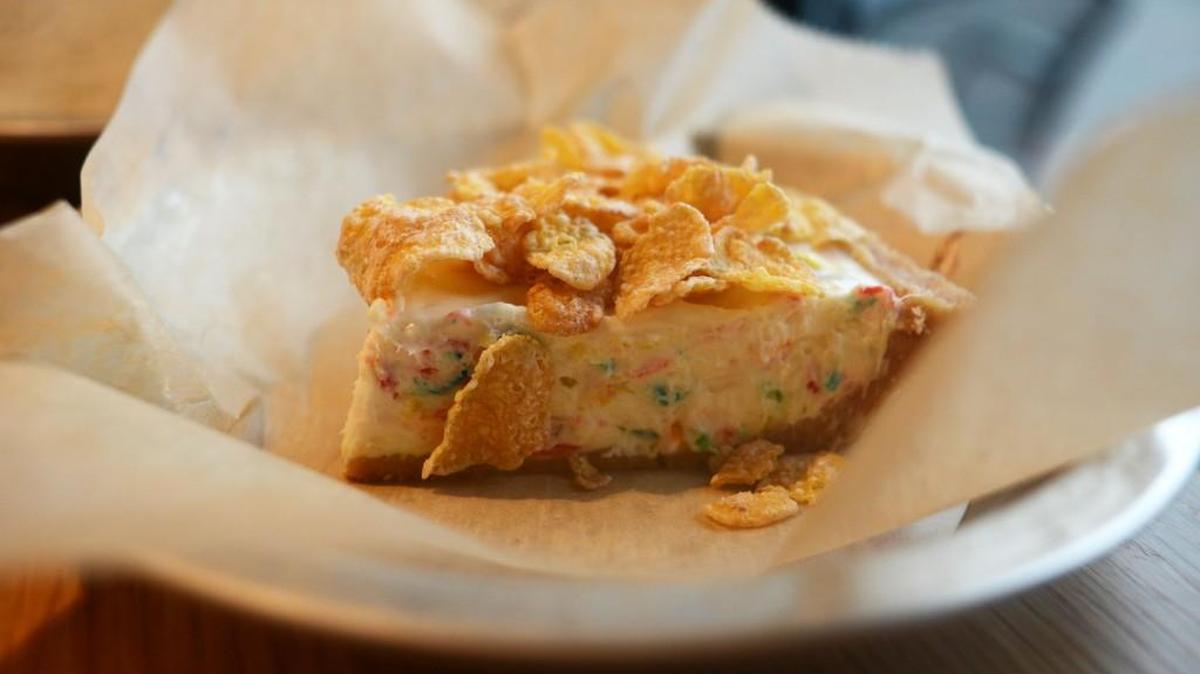 The “Cereal Killer” cheesecake at Pie Hole in Durham mixes Fruity Pebbles into the batter and is topped with Frosted Flakes.