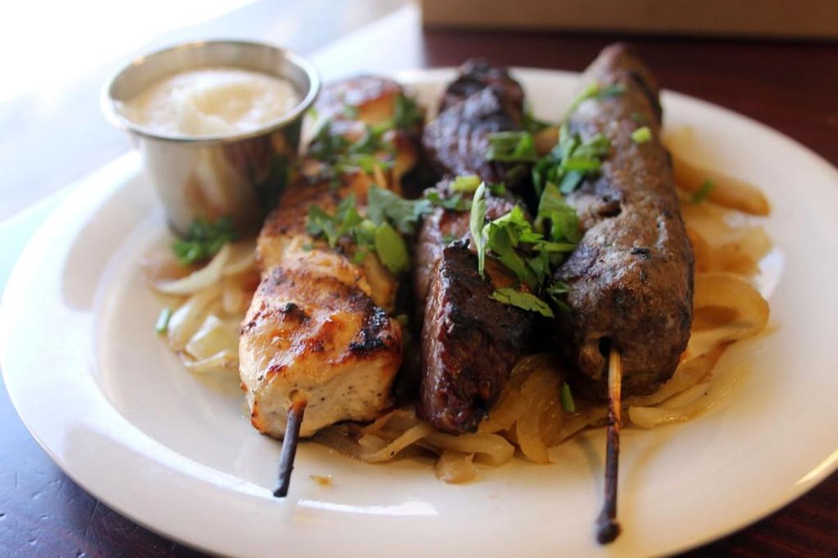 From left, grilled chicken and steak kabobs and lamb kafta. Neomonde has made the switch to using all-natural ingredients. The steak and chicken are grain fed. The lamb is all-natural grass fed.
