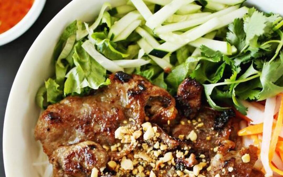 Vermicelli dishes (bun) at Mekong are edible kaleidoscopes of bright veggies and the protein of your choice on a bed of rice noodles, garnished with crushed peanuts. The grilled pork is pictured here.