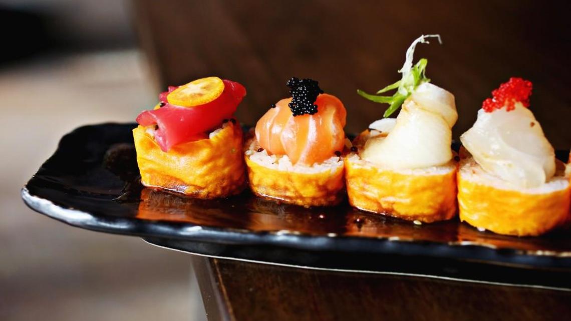 The Ultimate Rainbow is one of several specialty rolls at City Market Sushi in Raleigh made up of snow crab, avocado and cucumber wrapped in soy paper and tuna, salmon, yellowtail, red snapper, amber jack, shrimp and wasabi yuzu on the outside.