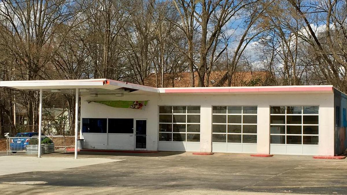 This former Gulf service station is being renovated into a space that will be used by Local Yogurt and Joe Van Gogh.
