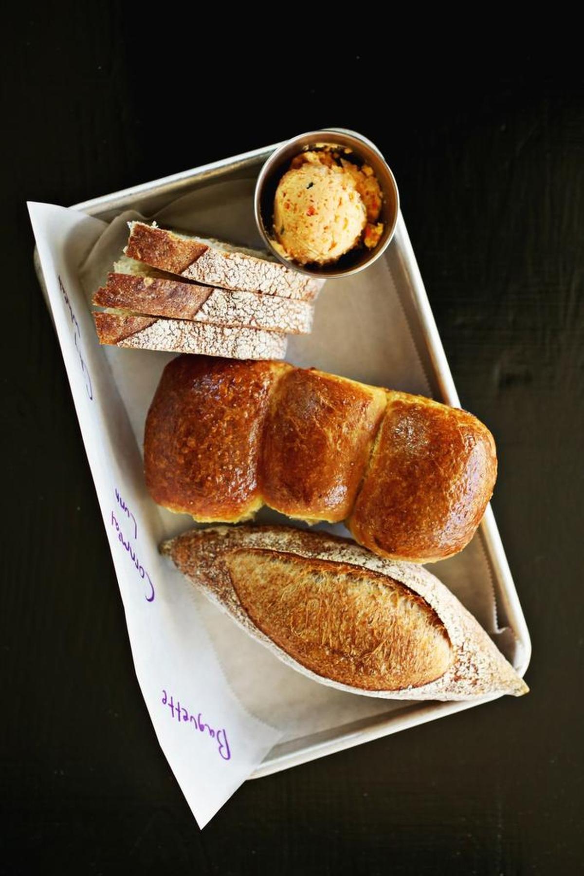 Start with a sampling of Phoebe Lawless’s celebrated baking skills at The Lakewood in Durham. Her sampler of house-baked breads – recently, crusty City Wheat, classic mini-baguette and a delightful cornmeal riff on Sally Lunn buns, served with kimchi butter – is worth every penny.