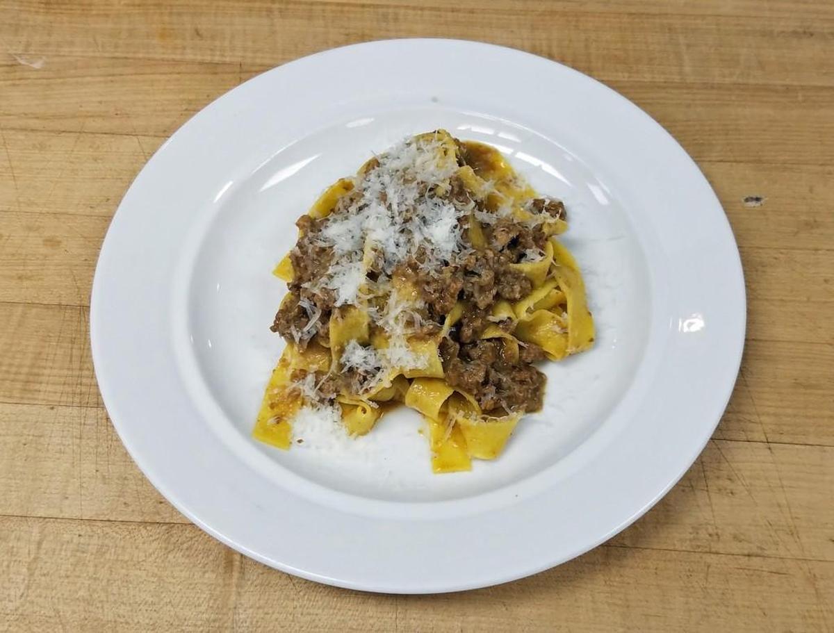 Serve Ragu Bolognese with Tagliatelle with a bold Sangiavese wine, a hunk of crusty bread and maybe a fresh green salad