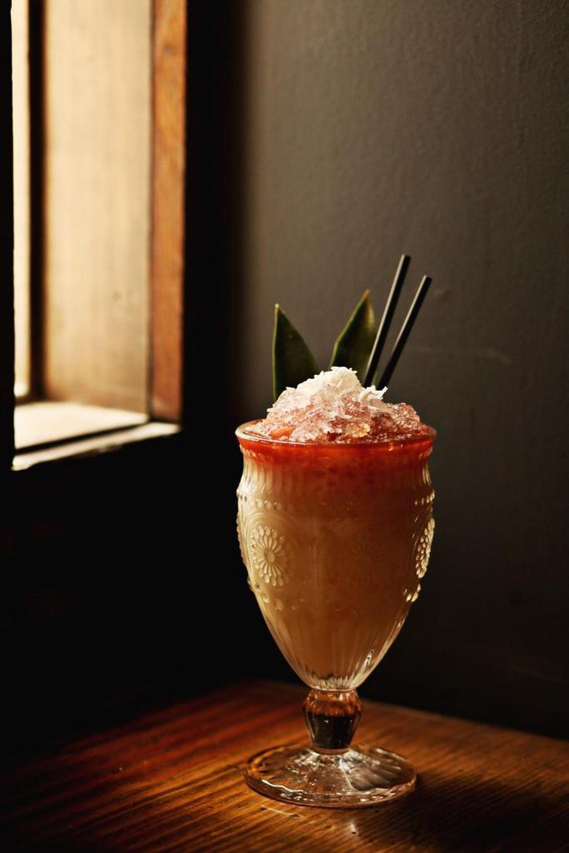 Aikane’s Hula House from Gallo Pelón Mezcaleria is made up of Wahaka Joven Mezcal, Lemon Hart 151, Grilled Pineapple Juice, Coconut Cream, House Orgeat, and Angostura Bitters.