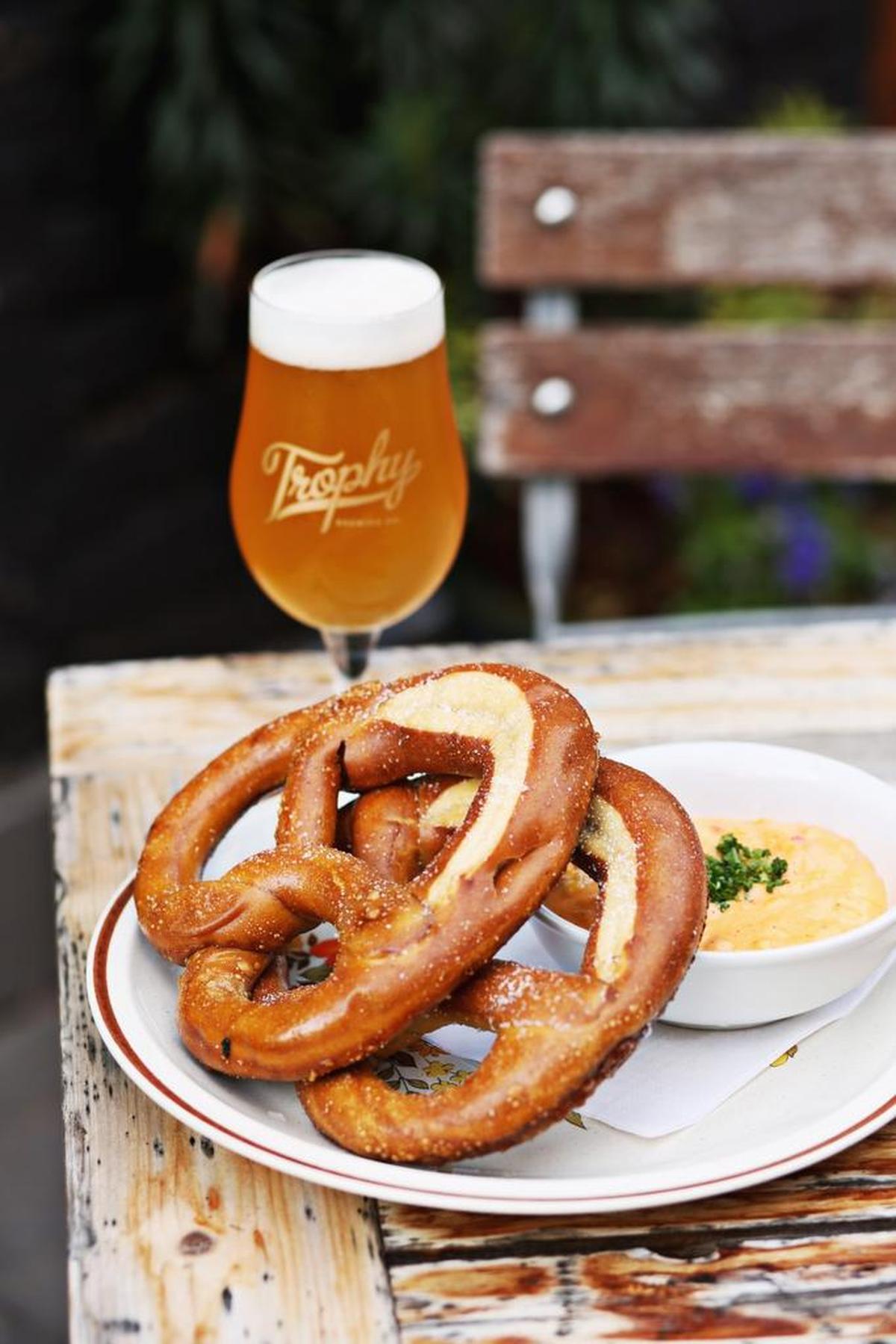 Tap + Table in Raleigh serves Soft Pretzels with warm pimento cheese as a perfect compliment to their beers on tap from Trophy Brewing Co. The menu is as eclectic— and as fluid, figuratively speaking — as the beer selection.
