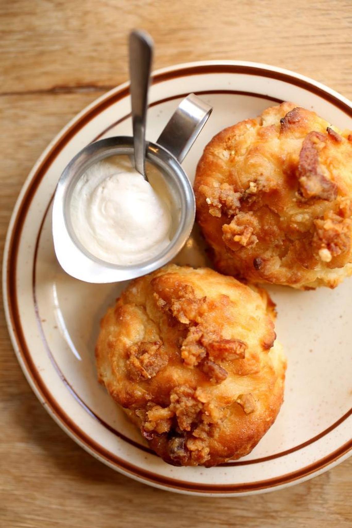 Light and buttery, their tops spangled with crunchy bits of pork crackling, the cracklin' biscuits are so addictive they might as well just drop a couple of letters and call them crack biscuits.