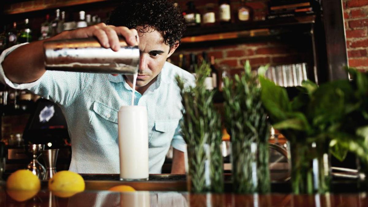 
Daniel Sartain, owner and managing partner at Bar Virgile in Durham, makes a Ramos Gin Fizz on Wednesday, July 29, 2015.
