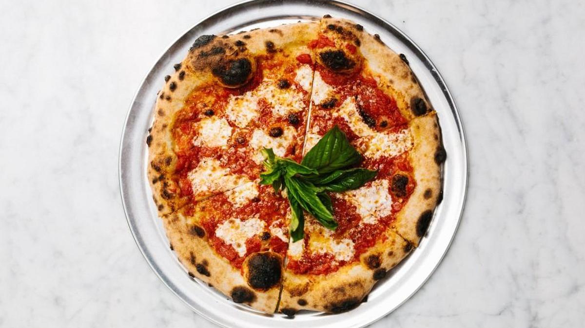 Benny’s Big Time Pizzeria in Wilmington has a menu with an eight-pizza roster of pies that includes the classic of classics, the margherita – just tomato sauce, buffalo mozzarella and basil.