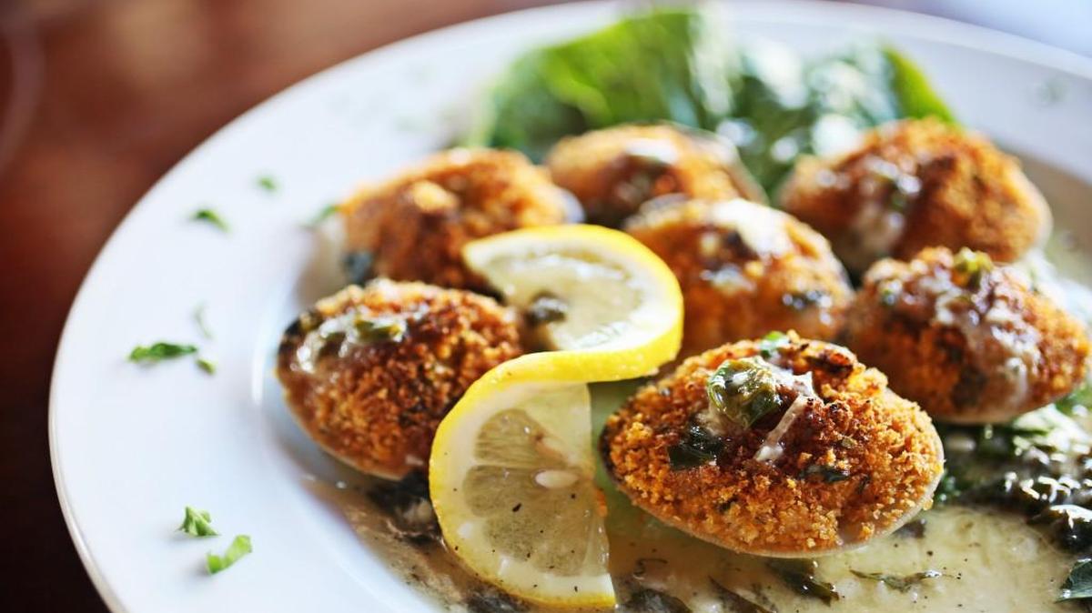 Clams Oreganata are littlenecks baked in garlic, white wine, lemon and butter beneath a tweed of toasted Italian bread crumbs and fresh herbs at Ricci’s Trattoria in Cary.