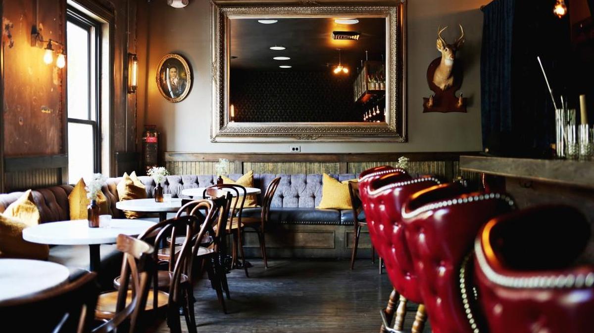 The Architect Bar & Social House has closed in downtown Raleigh, but its sister speakeasy bar The Green Light, pictured here, will remain open and unchanged.