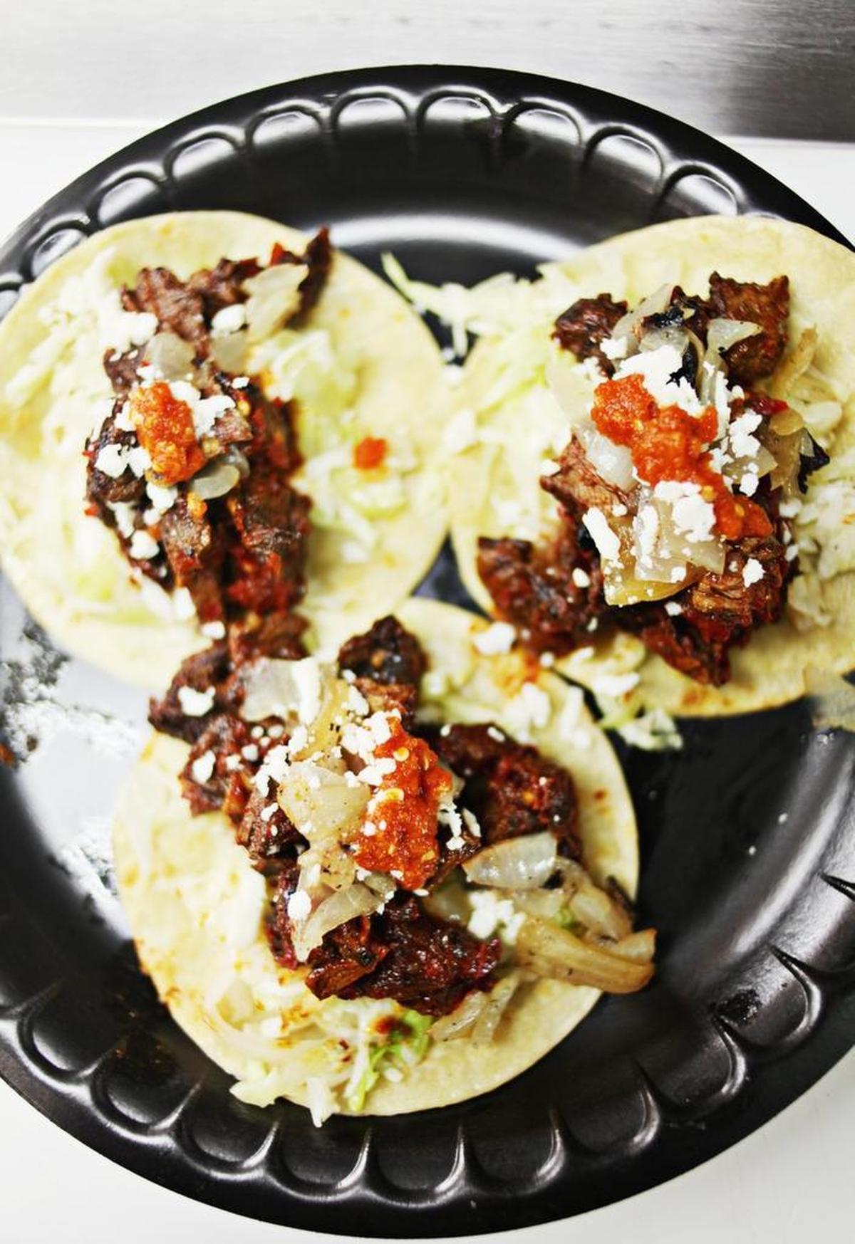 The Moo Moo, piled with marinated grilled skirt steak, thick-cut smoky bacon, fire-roasted onion, zippy salsa roja and crumbled queso, has already become the best-seller on the menu of The 13th Taco food truck.