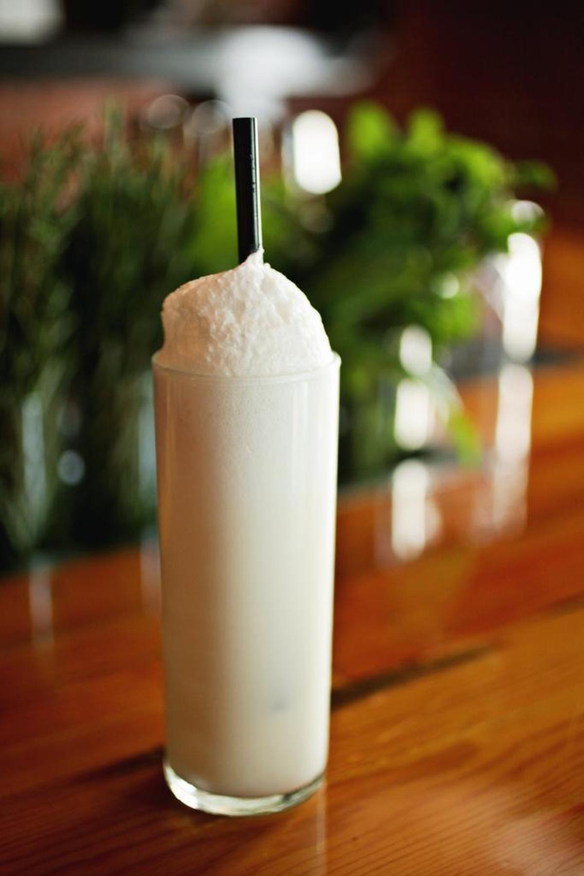 The Ramos Gin Fizz at Bar Virgile. Drinks are built with as much care as they are thoroughly researched, and as a bonus they’re served in distinctive and in some cases, historically accurate glassware.