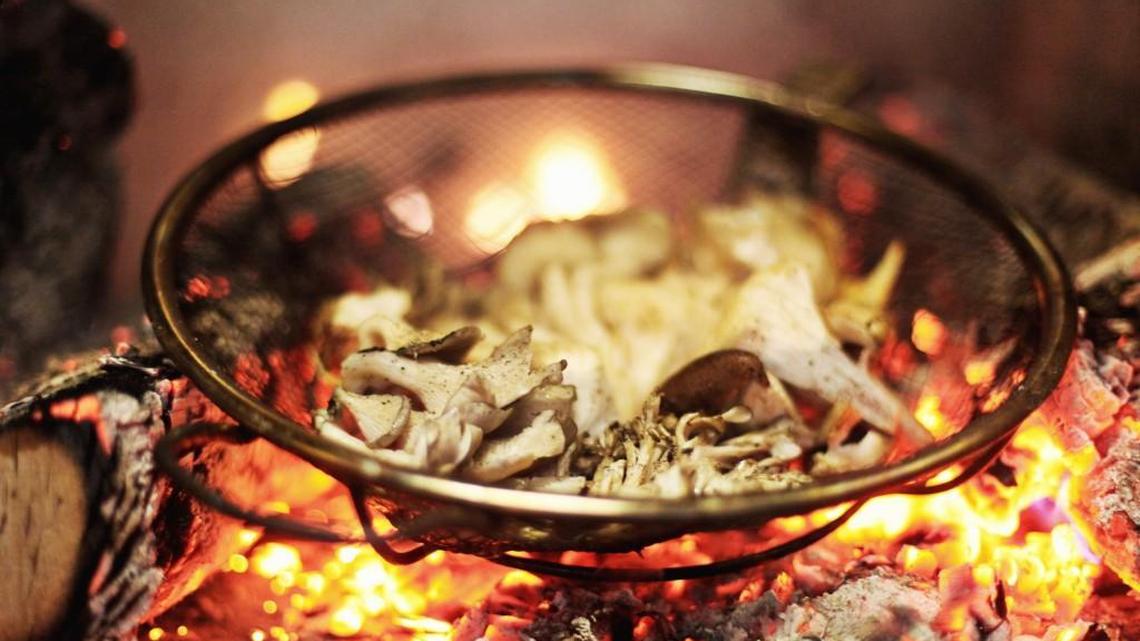 
Foraged and "fought for" mushrooms are roasted over a wood fire at Death & Taxes in downtown Raleigh.
