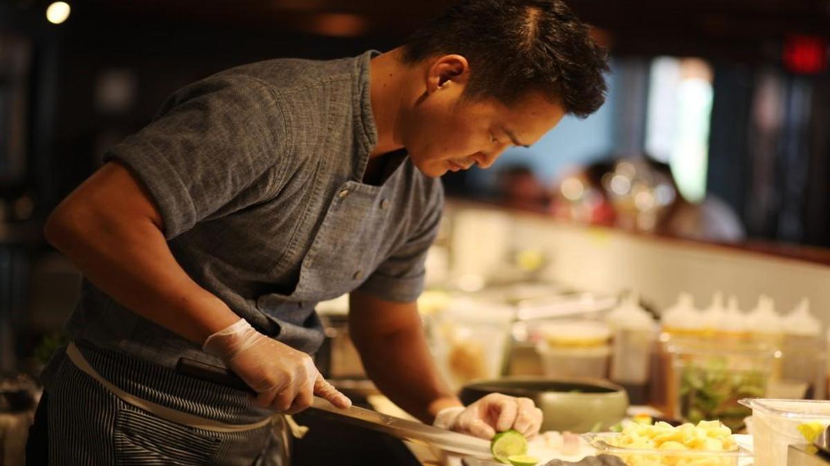 M Sushi owner/sushi chef Mike Lee’s knowledge of sushi culture is encyclopedic. Lee works in the open kitchen of the Durham restaurant on Thursday, June 30, 2016.