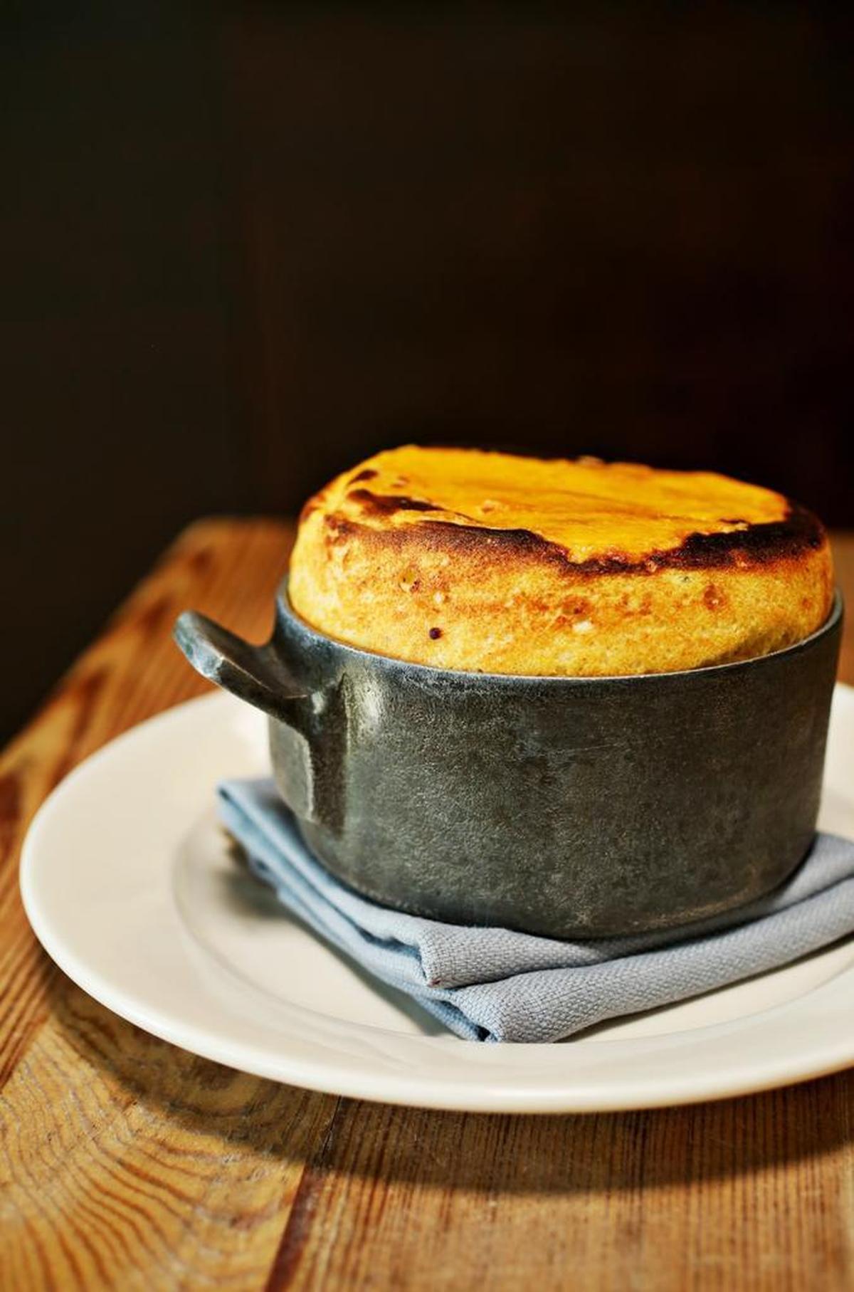 Standard Foods’ Spoonbread (think moist, fine-textured cornbread) is topped with a golden crown of molten cheddar, honey and sea salt, and served in the small cast-iron vessel it is baked in.