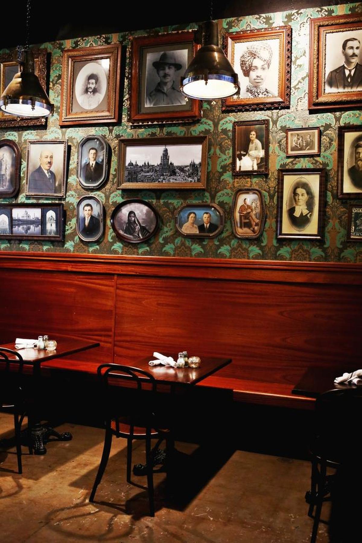 Opposite the bar in the narrow dining room at Viceroy, scores of sepia portraits in ornate frames hang on walls papered in dark, intricately patterned acanthus wallpaper. Sprinkled among the stern Anglo visages in starched white collars are a couple of bearded faces in Sikh turbans, supplying the requisite exotic spice to a decor that’s evocative of a London pub in the British Raj era.