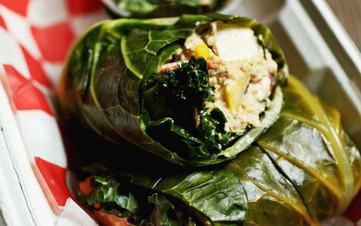 Order the collard leaf wrap, filled with house-made hummus, vegan feta and roasted veggies at Carroll's Kitchen, a nonprofit eatery dedicated to ending homelessness for women in Raleigh.