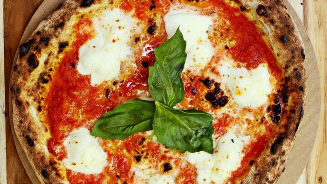 A perfect margherita pizza, its blistery, leopard-spotted crusted topped with just the right amount of crushed tomatoes, fresh mozzarella and basil. The Margherita on the Napoli food truck is one of Greg Cox’s favorites.