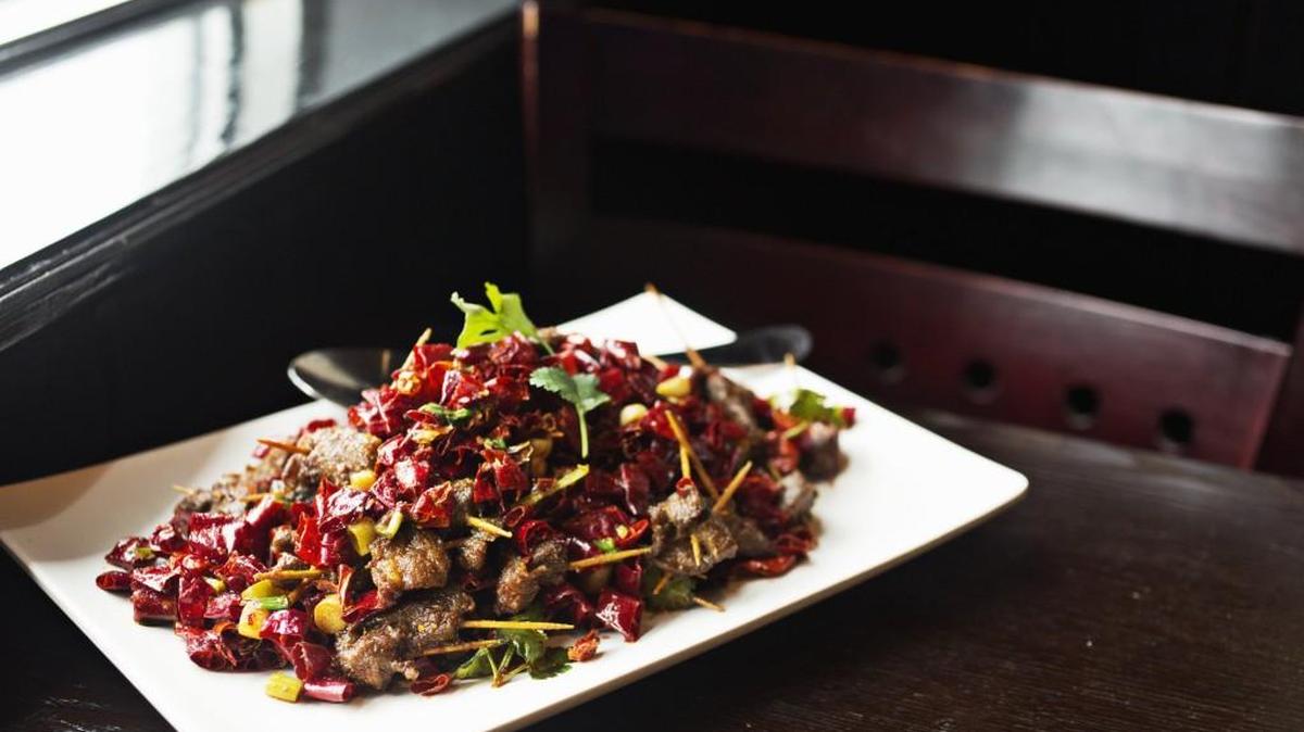 Order Lamb on toothpicks, which lives up to its name with bite-size morsels of lean lamb, each skewered on a toothpick, and amped up with an avalanche of toasted red chiles (and a jolt of Szechuan peppercorn), and you’ll understand why Derek Huang of Szechuan Taste says the dish is all the rage in New York.