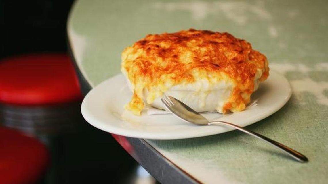 A crispy cheese top forms on the mac and cheese at Poole’s Diner in Raleigh.