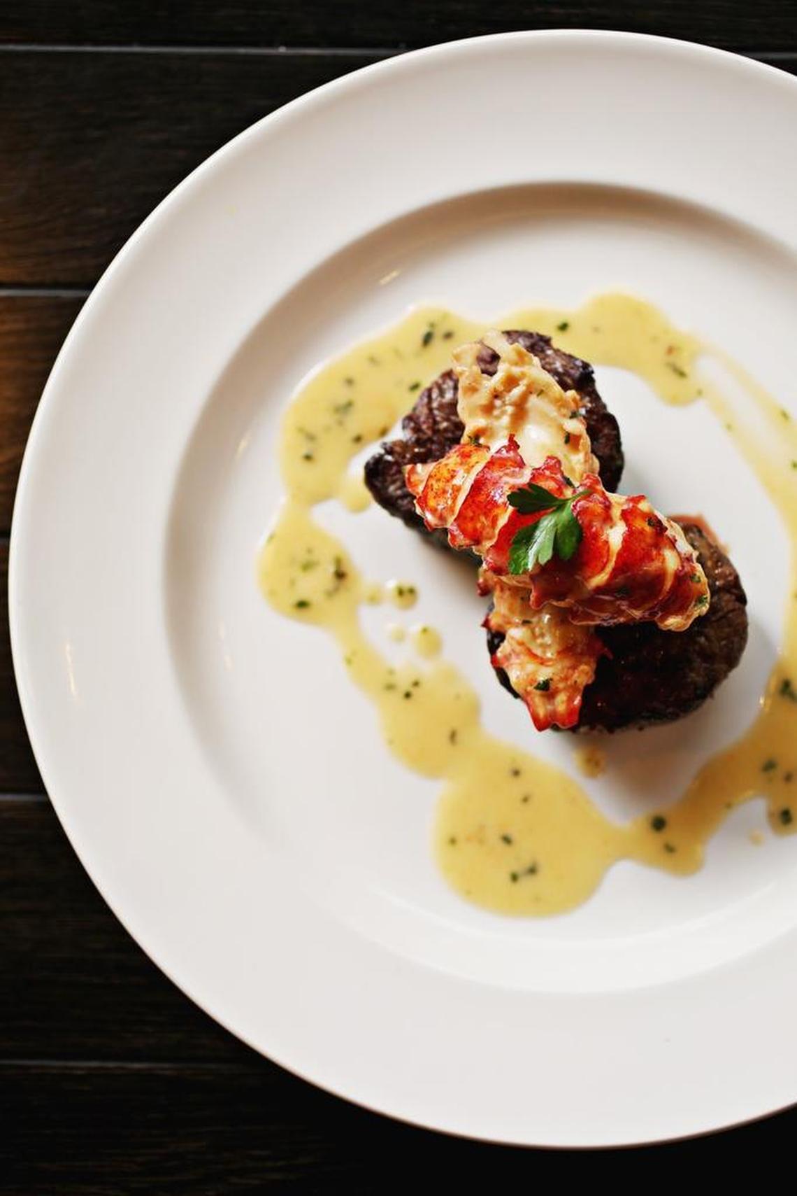 Seared tenderloin with butter poached lobster tails is from the chef’s suggestions on the dinner menu at The Capital Grille in Raleigh.