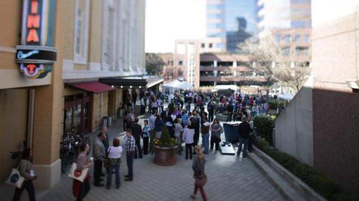 The plaza between the Convention Center and the Carolina Theatre in Durham is crowded with film festival attendees in 2014.