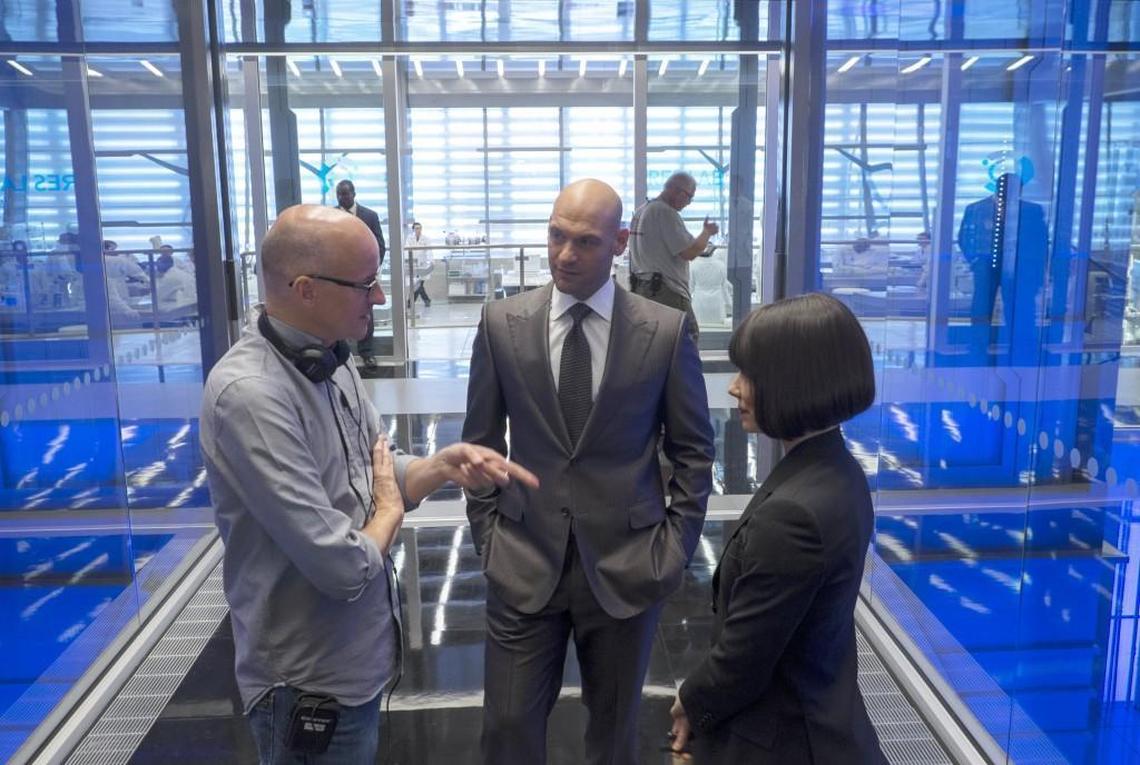 “Ant-Man” Director Peyton Reed on the set of the Marvel film with actors Corey Stoll (Darren Cross) and Evangeline Lilly (Hope Van Dyne) in 2014. Reed, a Raleigh native and UNC alum, directs the sequel, “Ant-Man and the Wasp.”