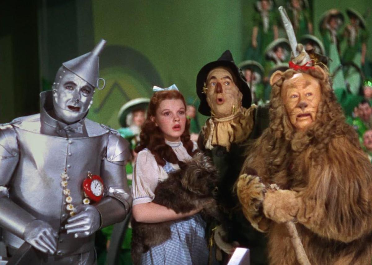 (L-R): Jack Haley as the Tin Man, Judy Garland as Dorothy, Ray Bolger as the Scarecrow and Bert Lahr as the Cowardly Lion in “The Wizard of Oz.”