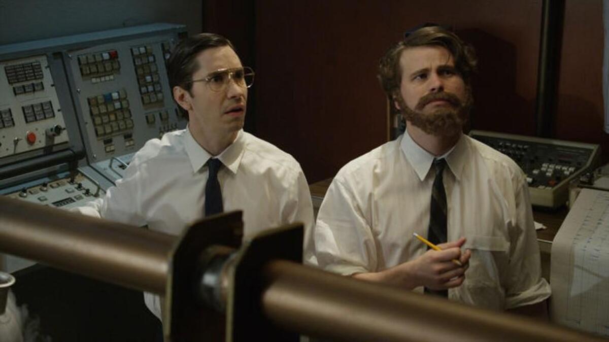 
Justin Long (left) as scientist Arno Penzias and Jason Ritter as scientist Robert Wilson in the Season 3 premiere of “Drunk History” on Comedy Central.
