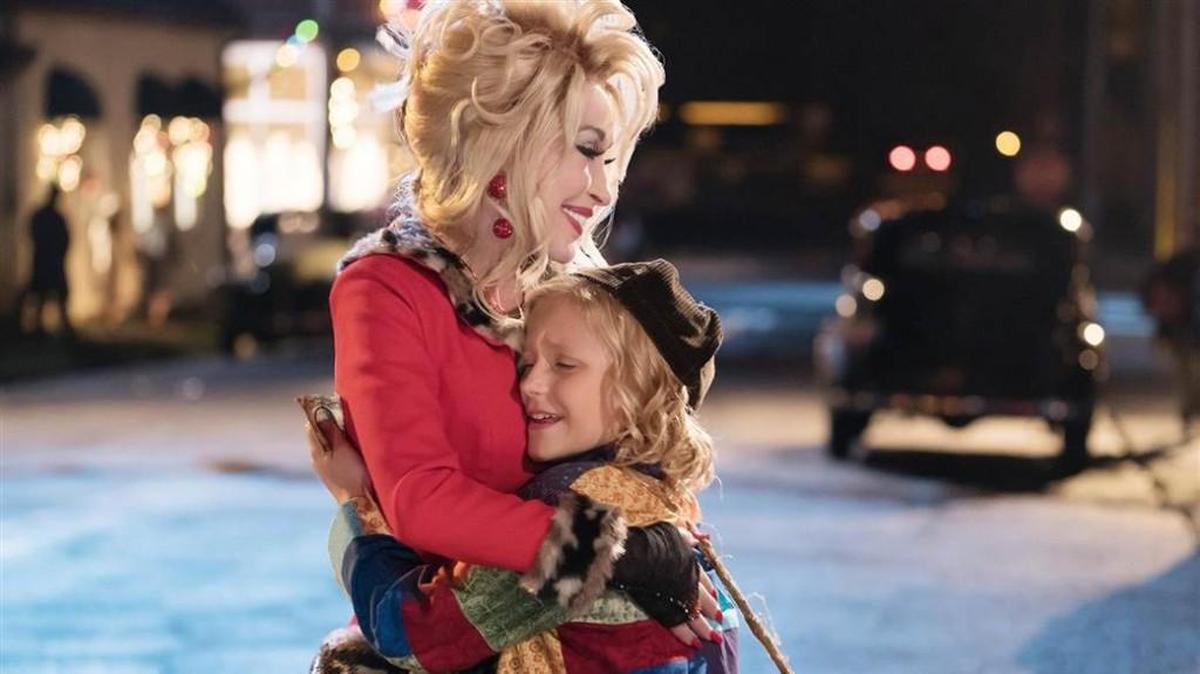 Dolly Parton with Alyvia Alyn Lind in “Dolly Parton’s Christmas of Many Colors: Circle of Love” on NBC.