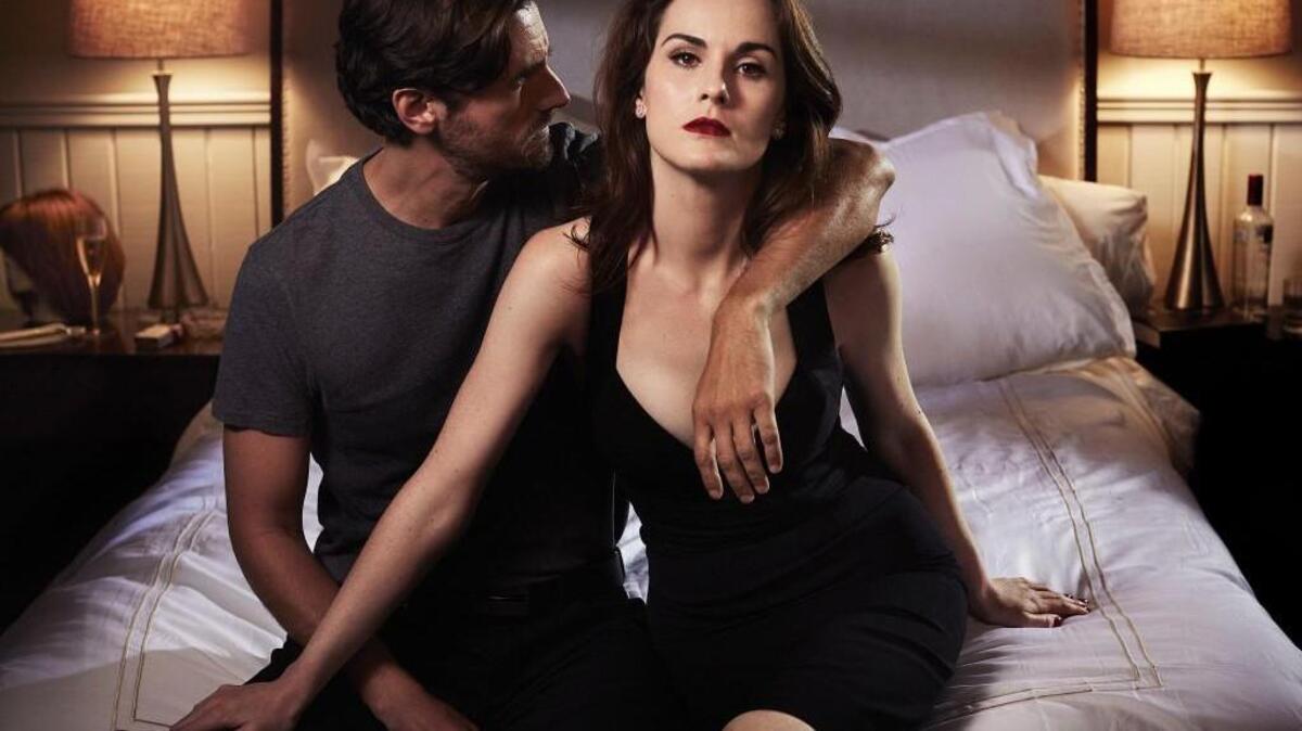 Juan Diego Botto, left, and Michelle Dockery in TNT’s “Good Behavior.”