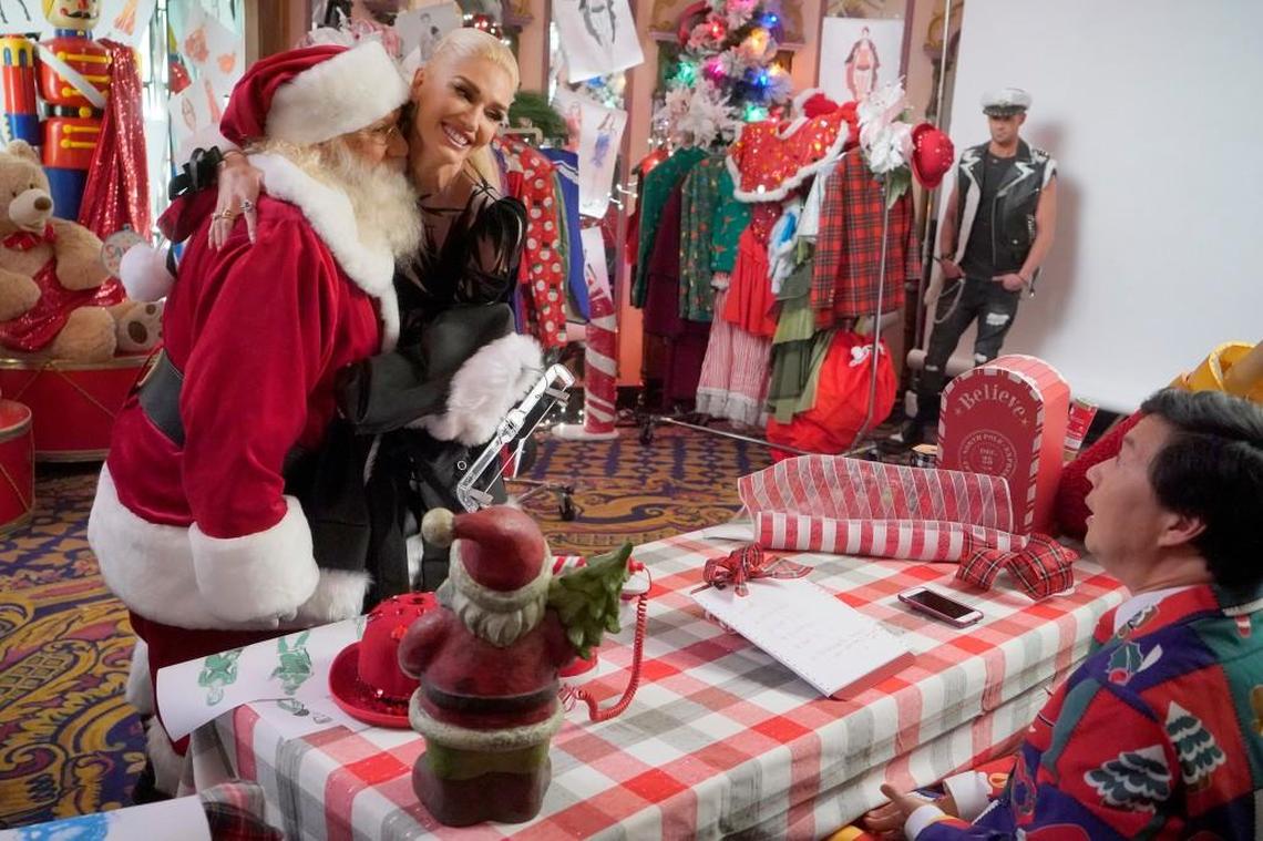 (L-R): Santa Claus, Gwen Stefani, Ken Jeong in “Gwen Sefani’s You Make It Feel Like Christmas” on NBC.