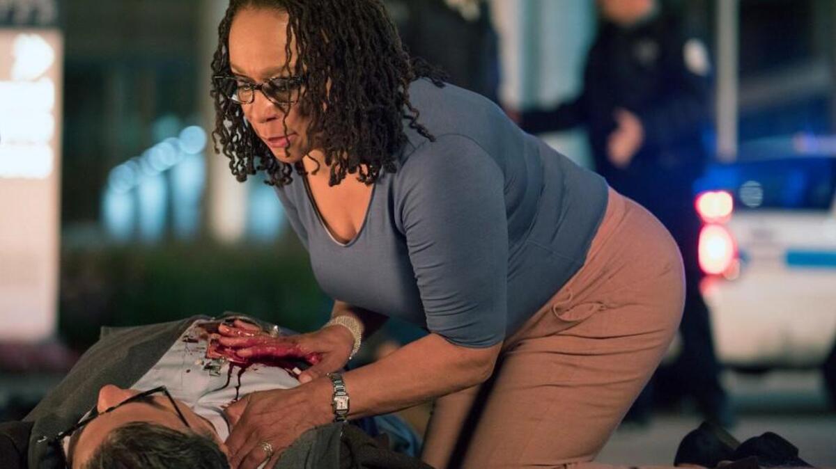S. Epatha Merkerson as Sharon Goodwin and Oliver Platt as Dr. Daniel Charles in NBC’s “Chicago Med.”