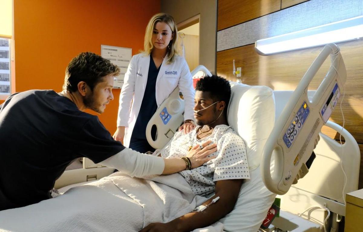 L-R: Matt Czuchry, Emily VanCamp and guest star Patrick Walker in the "Independence Day" time period premiere episode of “The Resident.”