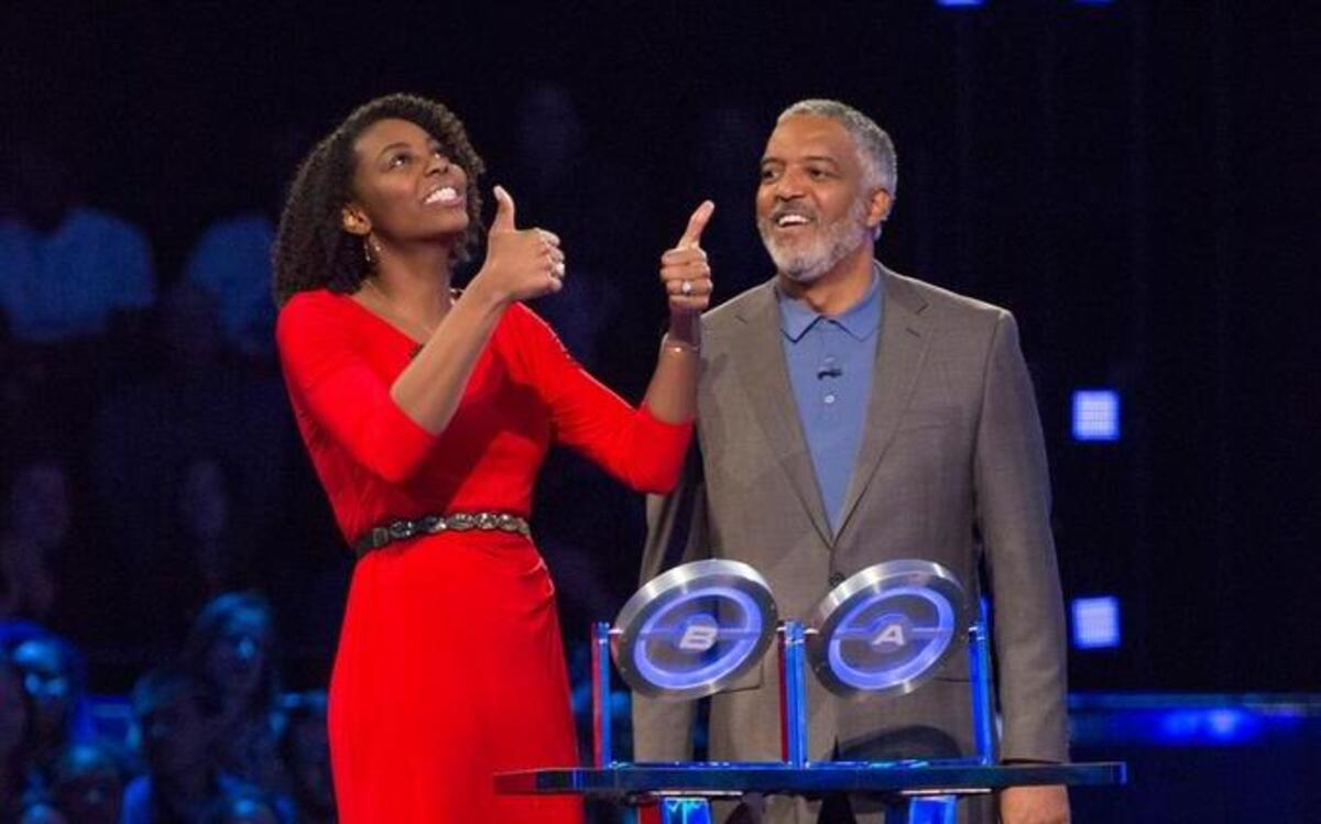 Milton Harrison, right, and Aaryn Hammond on the NBC game show “The Wall.”