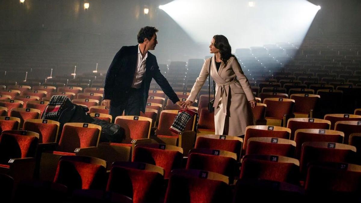 Eric McCormack, left, and Kristin Davis in “A Heavenly Christmas.”