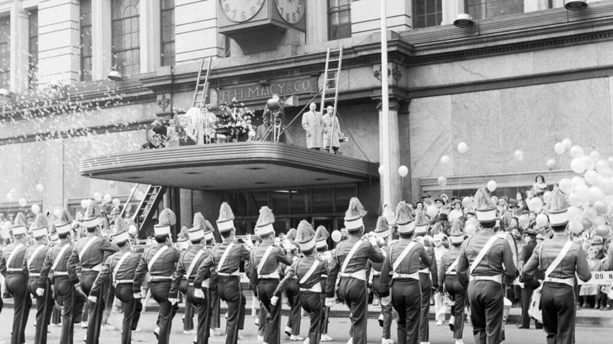 A marching band plays during the 1954 Macy’s Thanksgiving Day Parade in New York City.