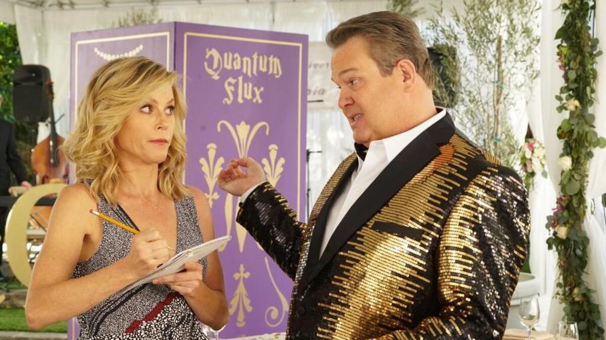 Julie Bowen, left, as Claire and Eric Stonestreet as Cam in “Modern Family.”