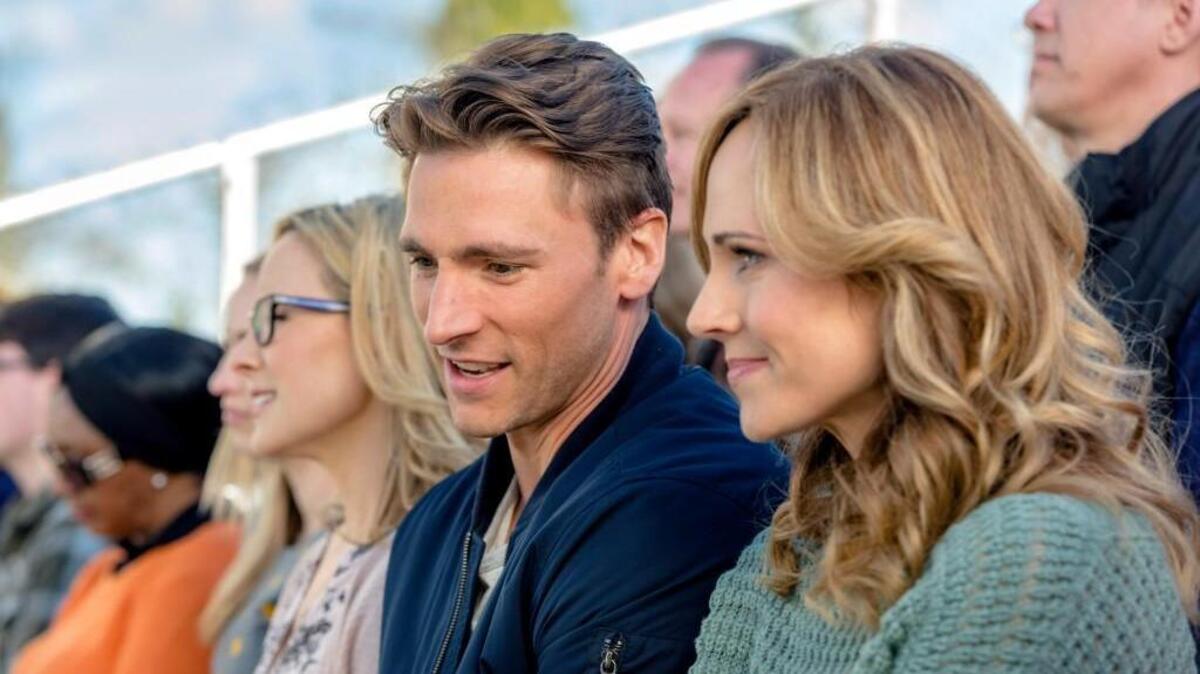 Andrew Walker, left, as baseball player Chase Taynor, and Nikki Deloach as Jessica Parker in the Hallmark Channel’s “The Perfect Catch.”