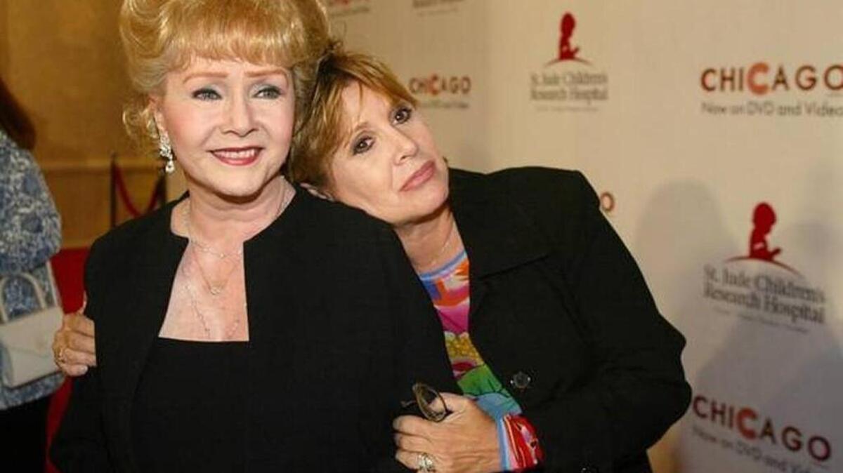 Debbie Reynolds, left, and Carrie Fisher in 2003.