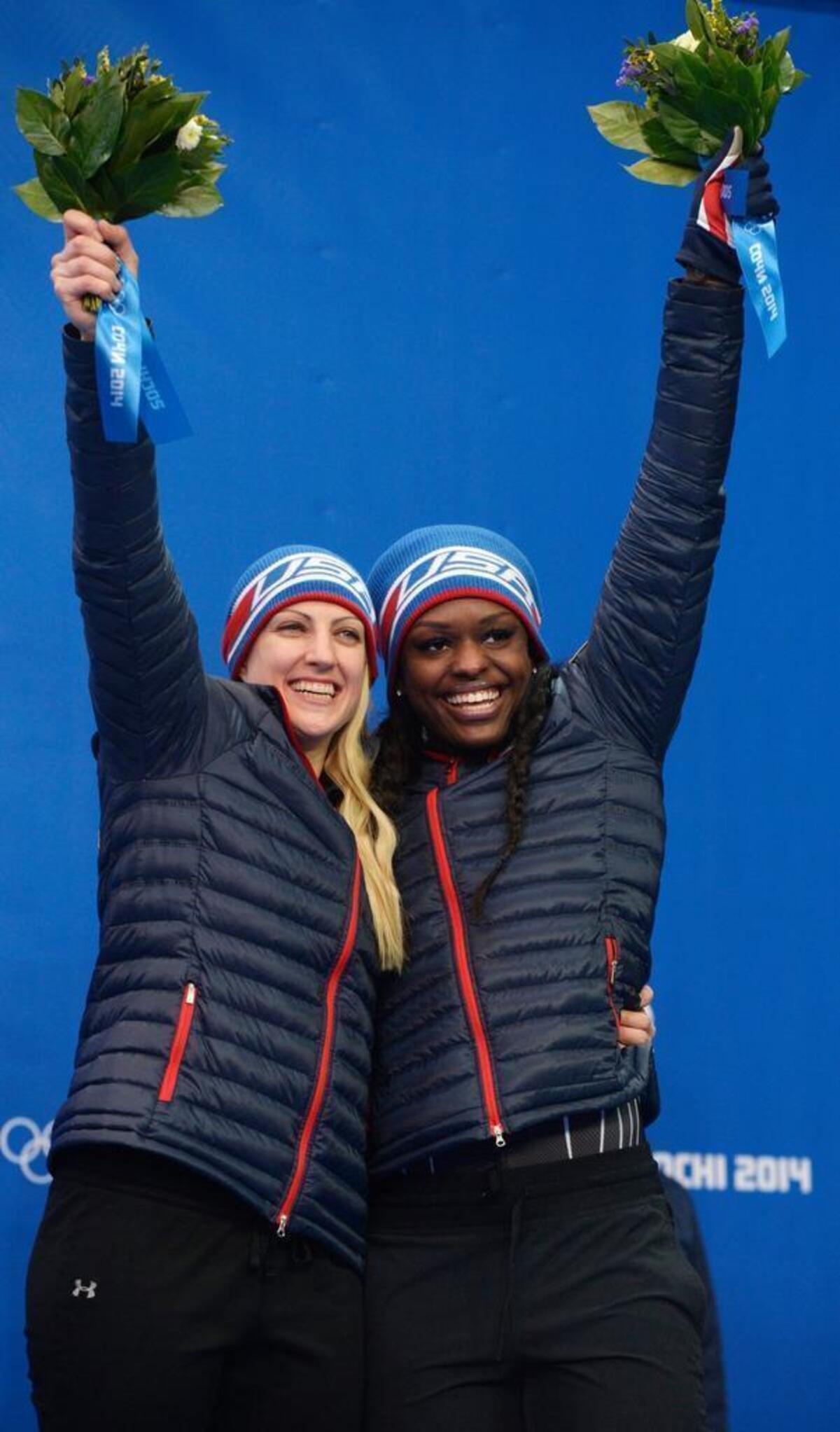 USA bobsledders Jamie Greubel Poser, left, and Aja Evans are competing in their second Winter Olympics. This photo was taken at the 2014 Olympics in Sochi, Russia.
