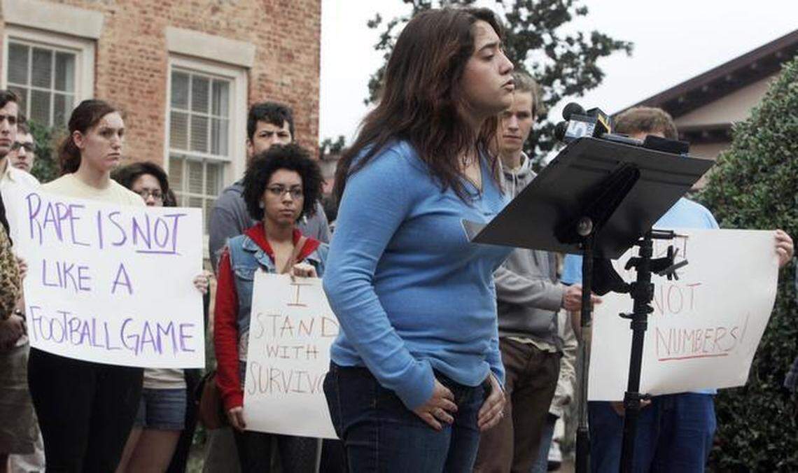 UNC-Chapel Hill students including Andrea Pino, foreground, speak during a campus press conference in January 2013. The students spoke out against what they say is a hostile environment and insufficient support at UNC for those who have been sexually assaulted.