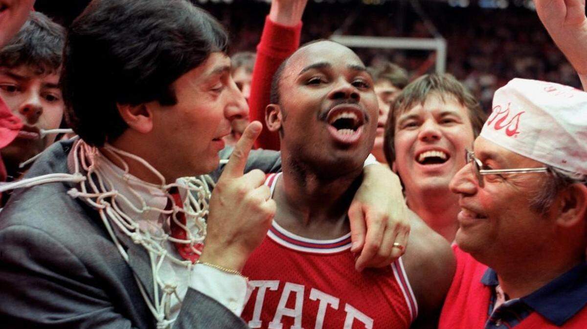 NCSU’s Jim Valvano and Sidney Lowe celebrate after NC State beat Houston to win the 1983 NCAA Championship in Albequerque.